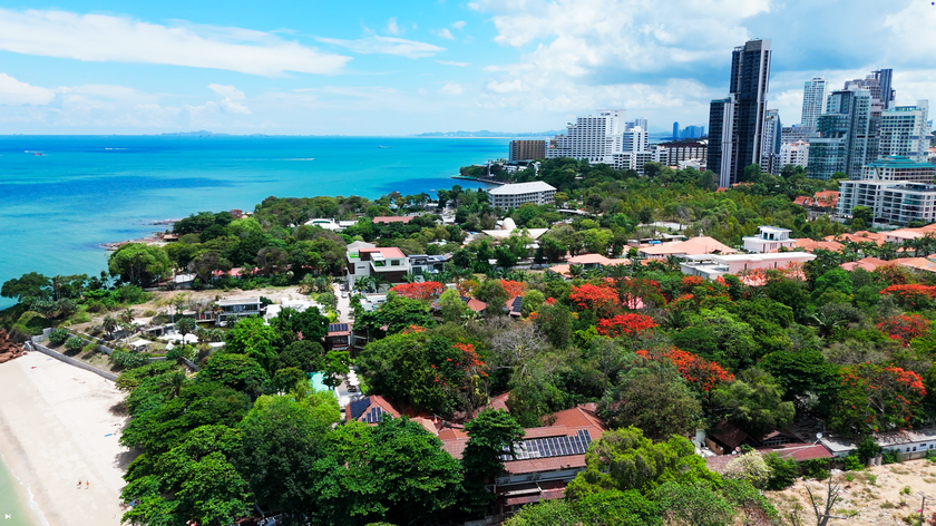 Elevated sea view across Pratumnak Hill, showing coastal residences, condominiums and the Gulf of Thailand.
